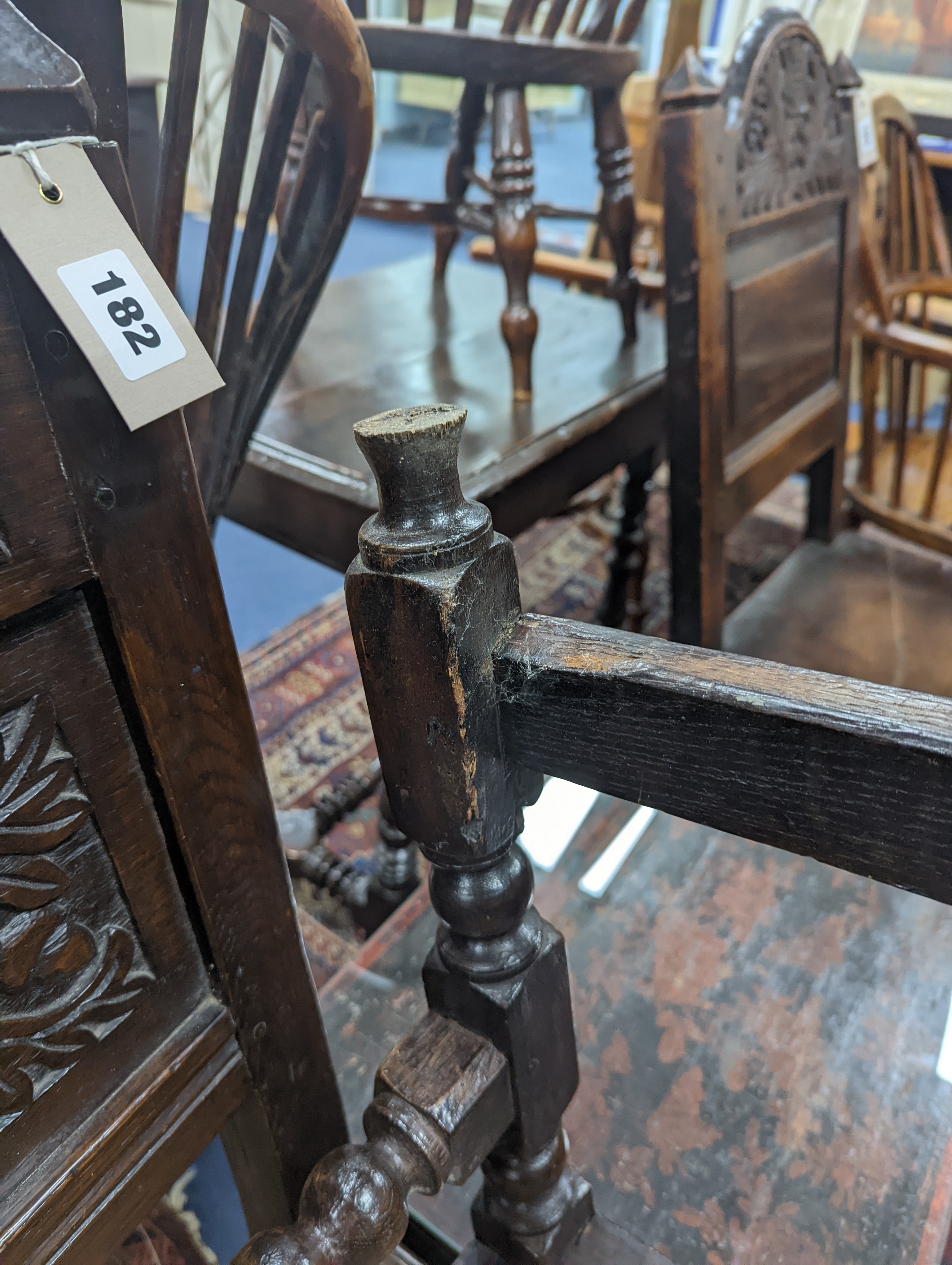 A pair of 17th century Lancashire carved oak side chairs, width 45cm, depth 39cm, height 101cm
